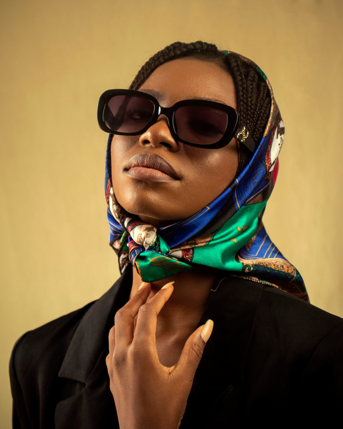 A Woman in Black Coat Wearing Black Sunglasses